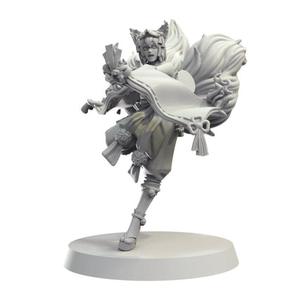 Unpainted model of a fierce kitsune woman in a dynamic pose, holding a fan, with prominent flowing tails on a base.