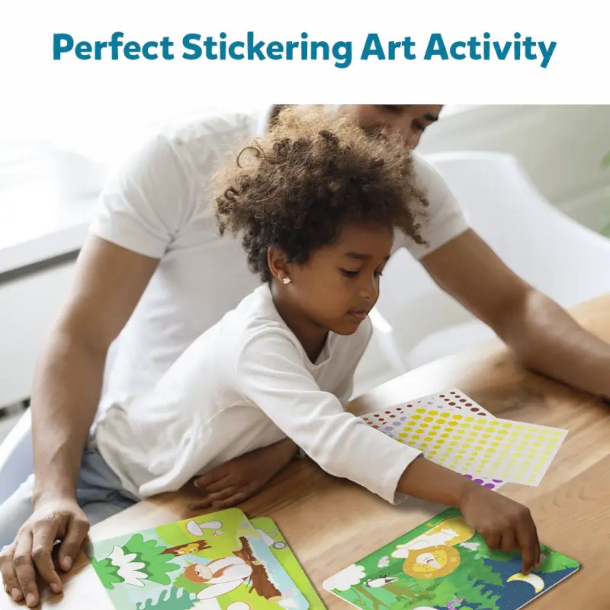 Young child and adult bonding over a sticker art activity, placing stickers onto animal scene cards