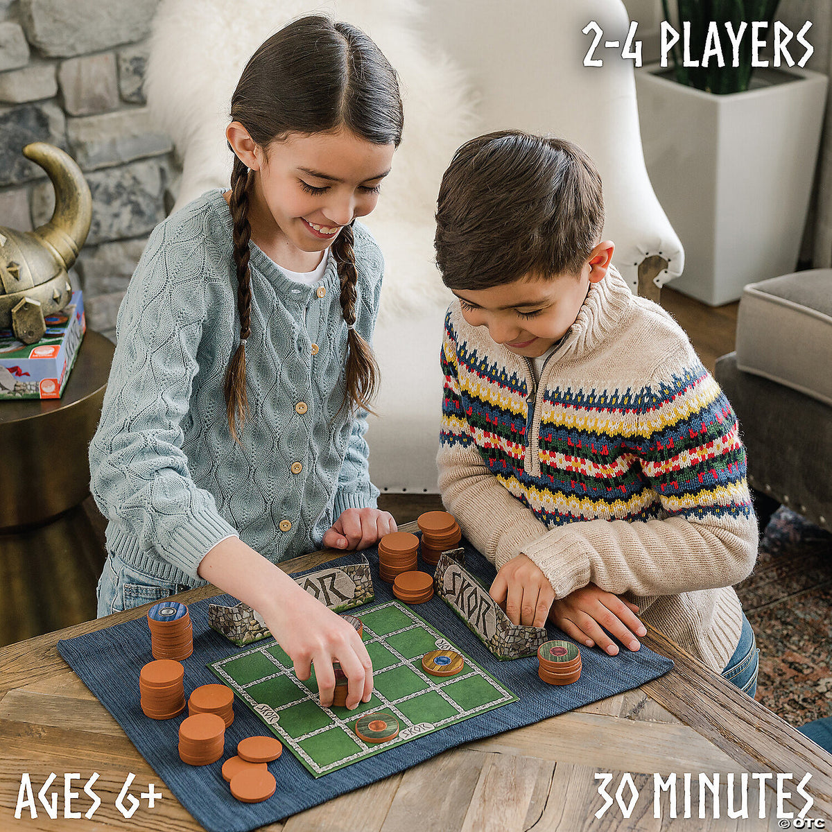 Skor game components displayed including colorful shield tiles and playing board