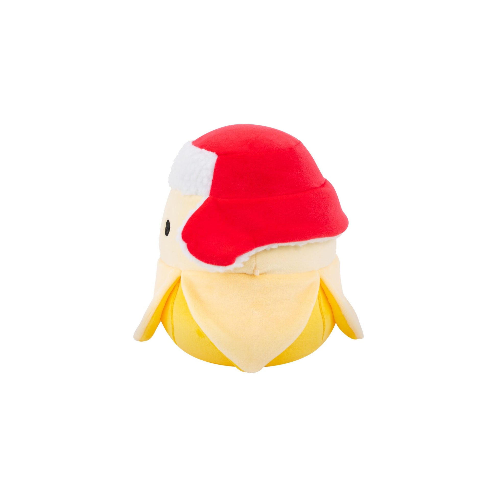 Yellow banana plush character wearing a red and white winter hat, isolated on white