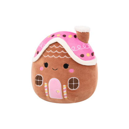 Gingerbread house plush toy with a pink icing roof, chimney and smiling embroidered face