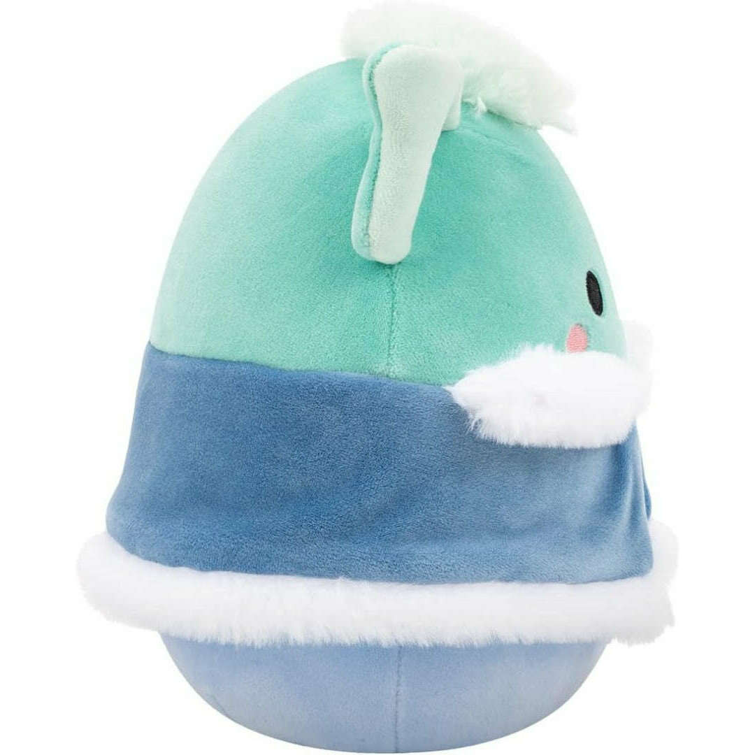 Mint green and blue plush toy wearing a white fur-trimmed winter cloak