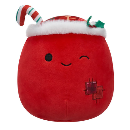 Round red plush character winking, wearing a white fur-trimmed holiday hat, candy cane and holly