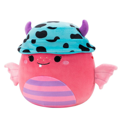 Pink Squishmallow monster plush with purple striped belly, pink wings, and a blue spotted hat featuring purple devil horns