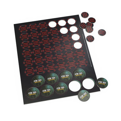 Star Trek Adventures game tokens: a sheet with red ALERT and green STAR TREK ADVENTURES tokens, some punched out