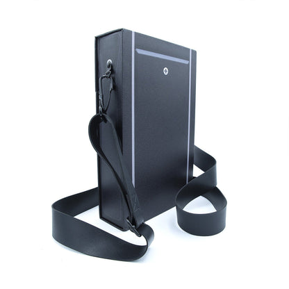 Rigid black Star Trek Adventures RPG - Tricorder Collector's Box Set with a shoulder strap, two grey vertical stripes, and a white plus sign