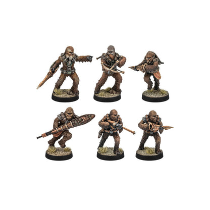 Six painted Wookiee-like tabletop miniatures in various combat poses, armed with heavy rifles and bowcasters