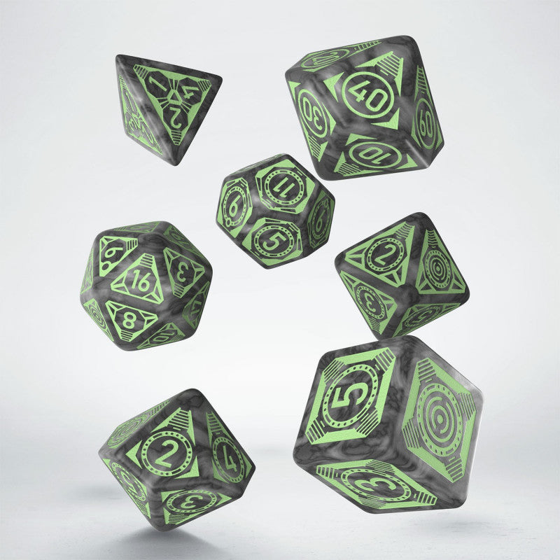 Seven dark gray marbled Q Workshop Pathfinder Mummy&#39;s Mask dice with light green numbers and symbols float in the air