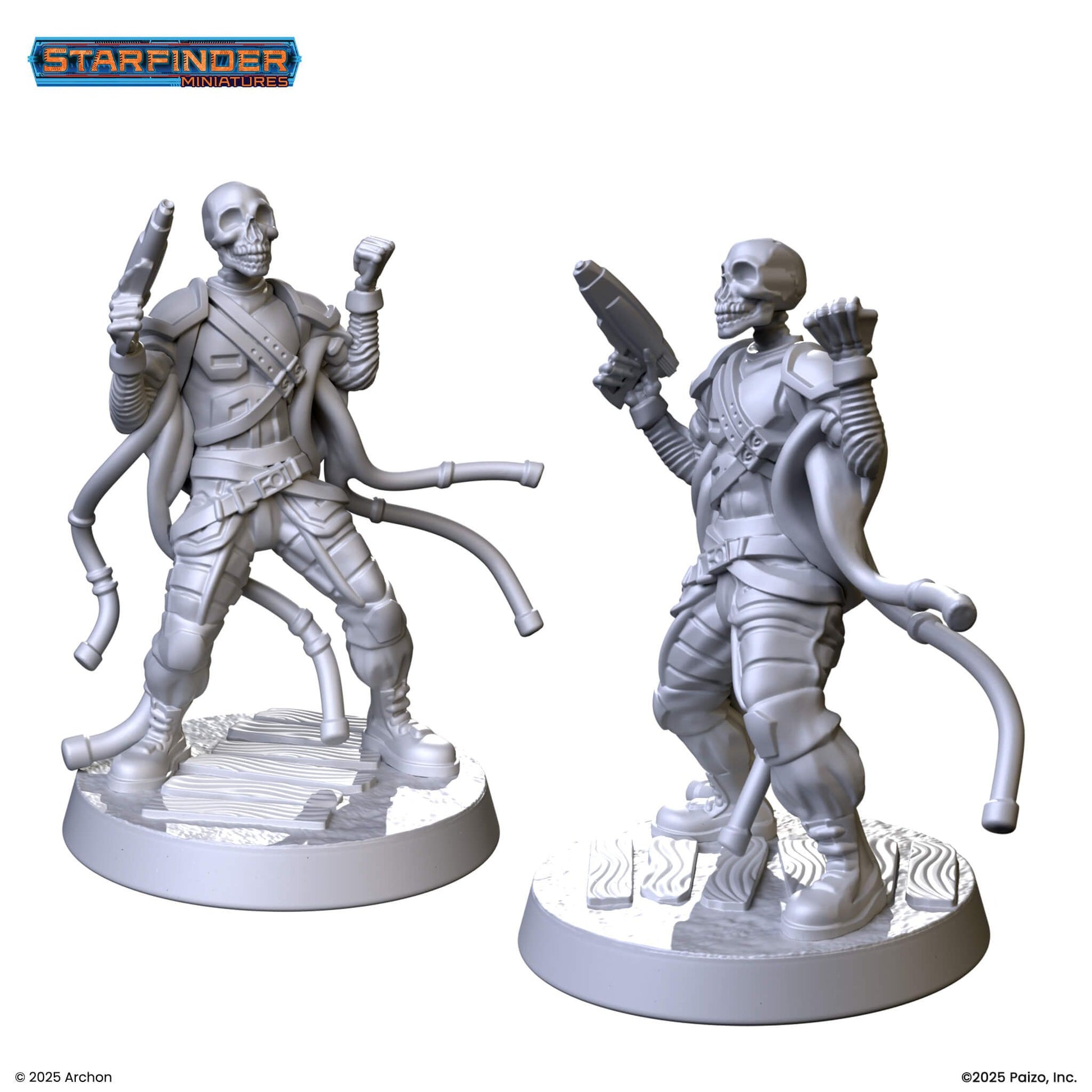 Two grey sci-fi miniatures of skull-headed figures in armor, each armed with a pistol