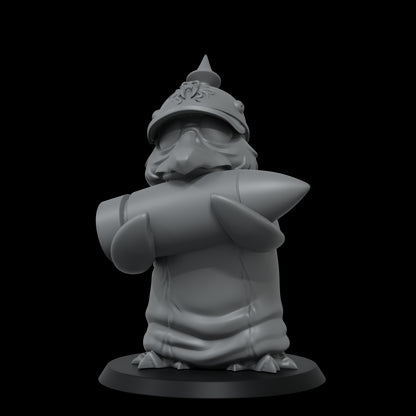 A grey gnomish figure wearing a spiked helmet and goggles, tightly gripping a large rocket across its chest.