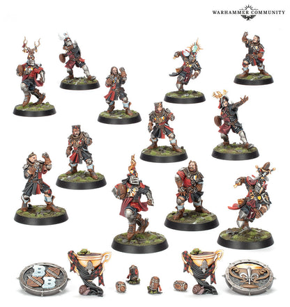 Painted Blood Bowl team miniatures (12 players) in red/black uniforms, plus tokens and trophies