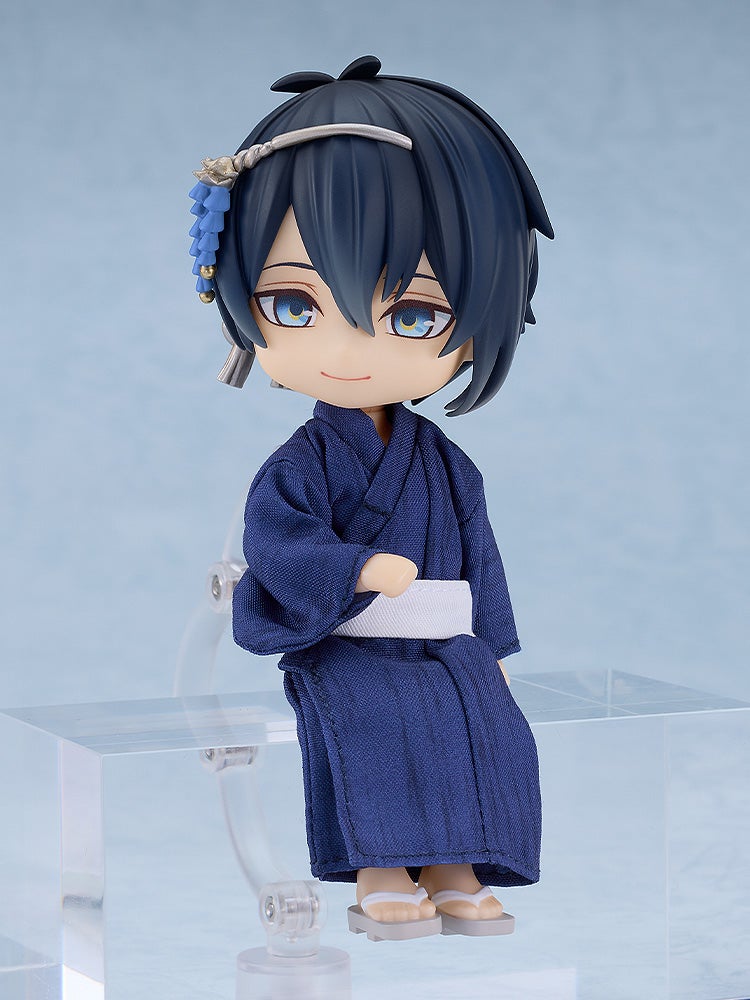 Nendoroid-style anime figure in dark blue yukata, white obi, and grey geta sandals, sitting