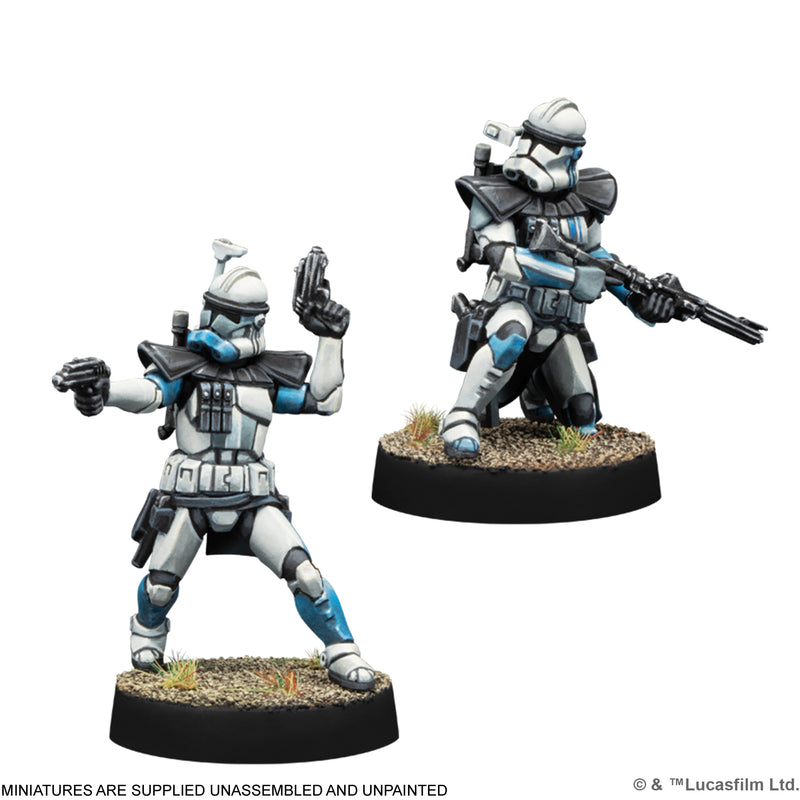 Two blue-marked Clone Trooper miniatures: one standing with pistols, one kneeling with a rifle