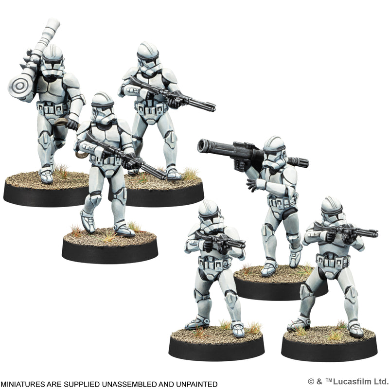 Six painted Star Wars Clone Trooper miniatures with rifles and heavy weapons on bases