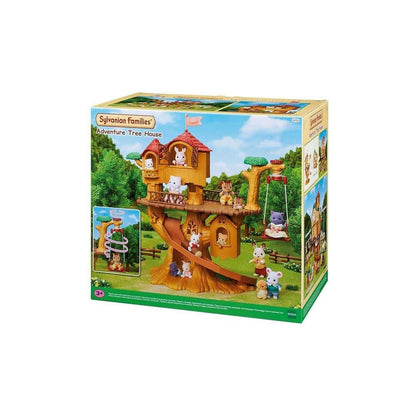 Boxed Sylvanian Families "Adventure Tree House" playset, showing figures on the wooden structure, slide, and swing