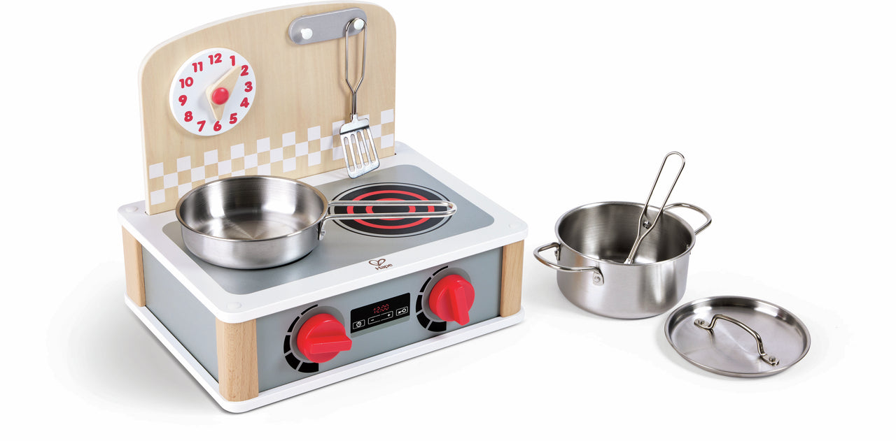 Wooden toy kitchen stove set with stainless steel frying pan, pot, spatula, clock, and red knobs