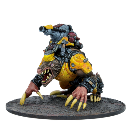 Miniature of a brown beast in yellow armor with an open, fanged mouth and a large cannon mounted on its back