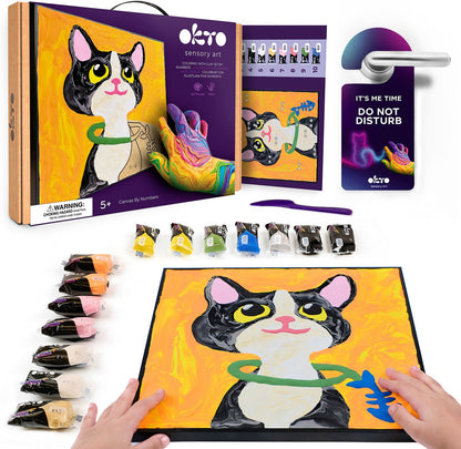 Clay by Numbers sensory art kit components displayed, showing a child's hands creating a textured cat picture