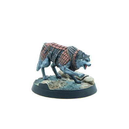 Miniature of a grey wolf wearing segmented brown armor, snarling and lunging forward on a rocky base