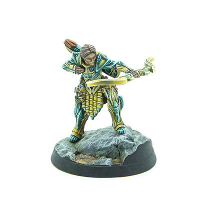 Painted miniature of an archer in green and gold armor, drawing a bow, standing on a rocky base