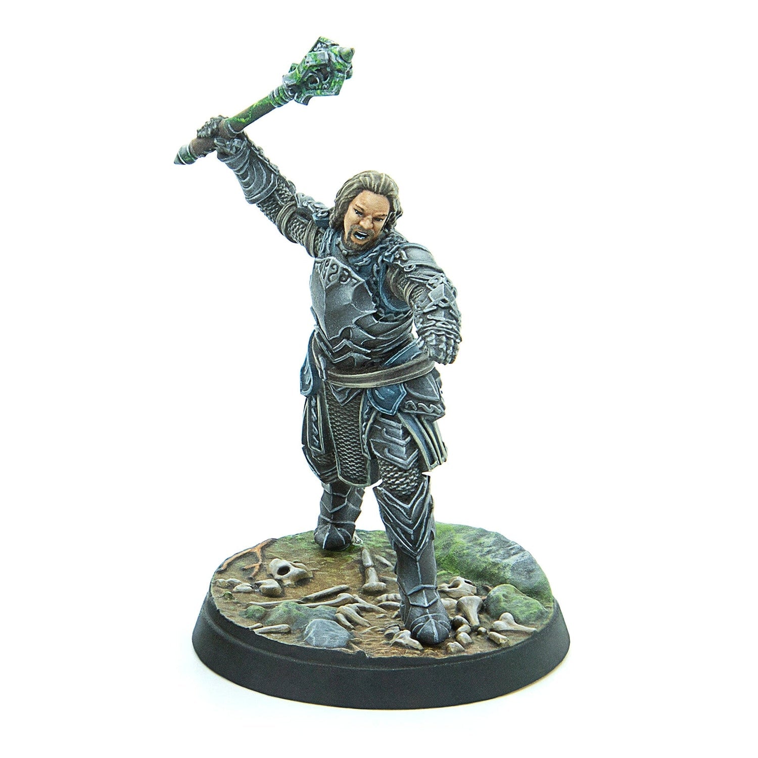 Miniature of an armored man with long hair, grimacing, raising an ornate green staff on a base with bones
