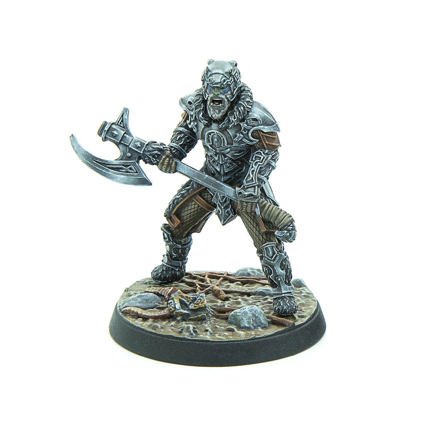 Painted miniature of a snarling, armored orc-like warrior with green skin, holding a large battle axe