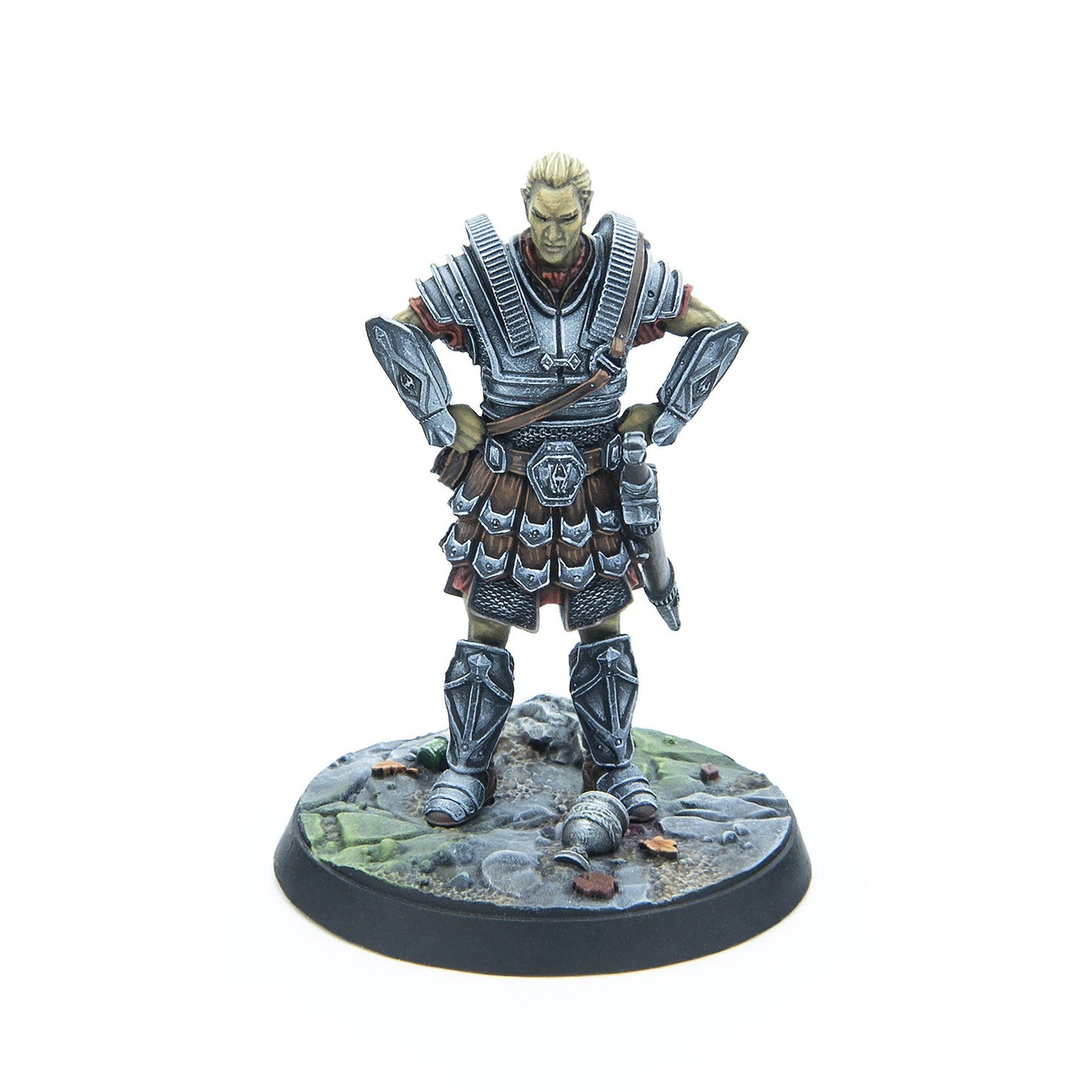 Armored fantasy warrior miniature with blond hair, pale green skin, and stern expression