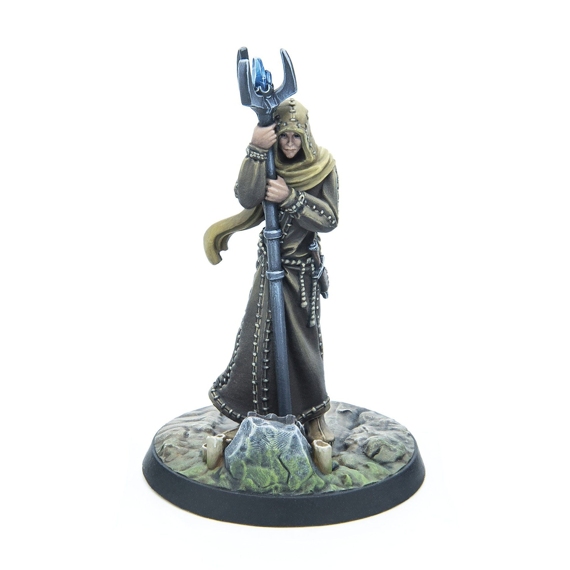 Fantasy miniature of a hooded, robed figure holding a staff with a blue crystal, standing on a rocky base