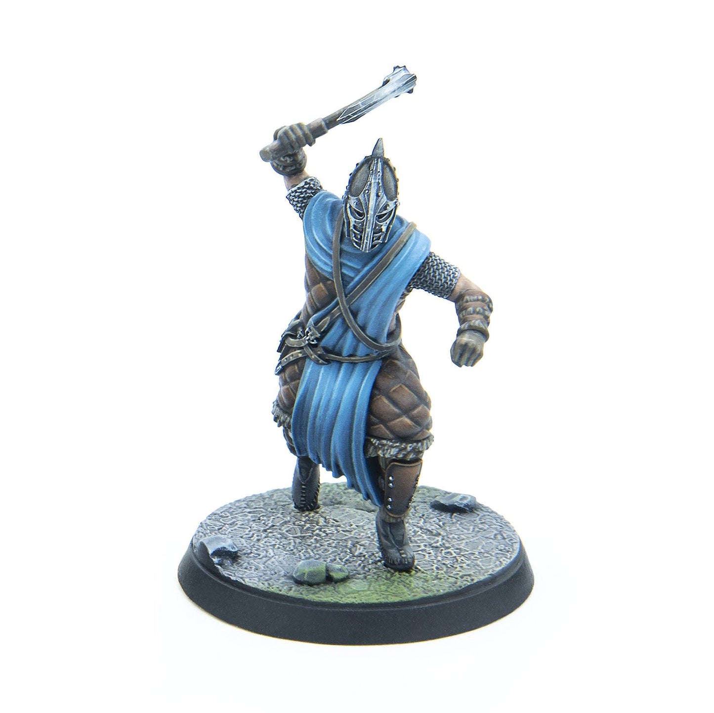 Miniature warrior in an ornate helmet and blue tunic, raising a spiked mace for an attack