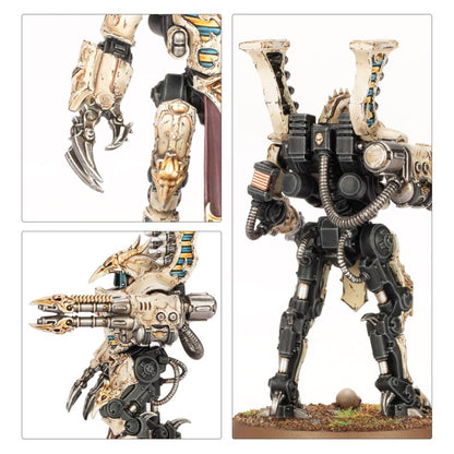 Detailed miniature of a black and bone-colored armored mech suit in four sections, showing claws and a double-barreled gun