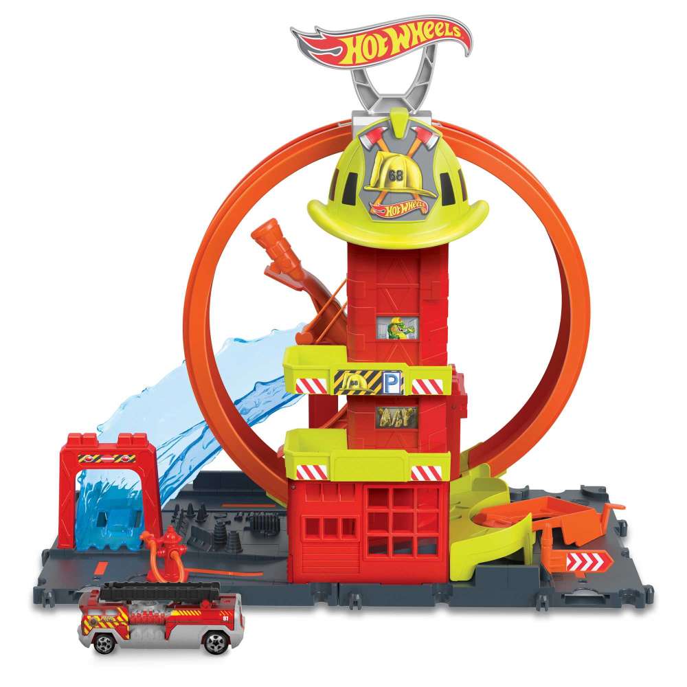 Hot Wheels City Super Loop Fire Station playset: red tower with fireman's helmet, orange loop track, water effect, and toy fire truck