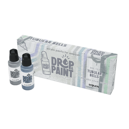 A Tubular Bells paint set includes a white box and two paint bottles, one gray labeled Black Metal and one bluish-gray labeled Bluish Metal