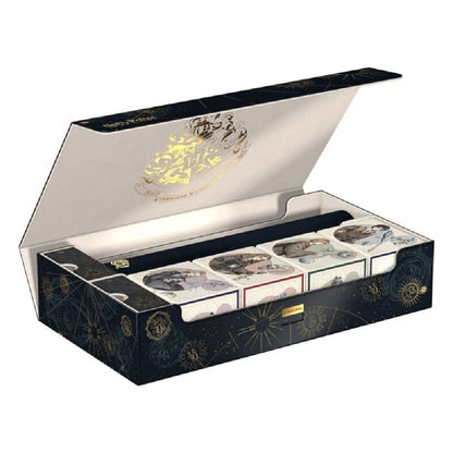 Open Harry Potter collector's box with a gold Hogwarts crest, containing a wand and four small illustrated boxes