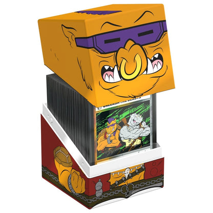 Orange and red deck box decorated with a cartoon pig face, lid open showing a stack of TCG cards