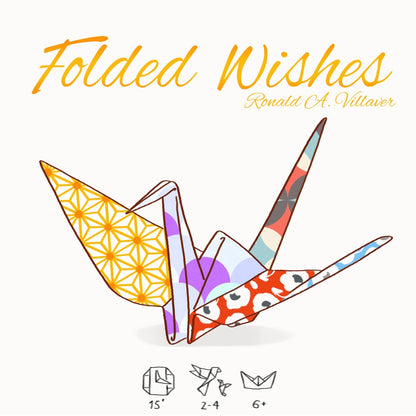A colorful origami crane made from patterned paper. Title: 'Folded Wishes' by Ronald A. Villaver.