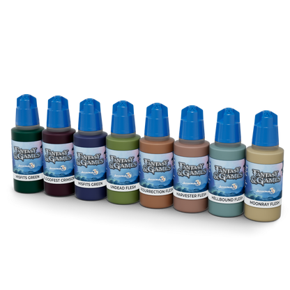 Eight Fantasy & Games miniature paint bottles in various colors, with blue dropper caps, lined up on a white background