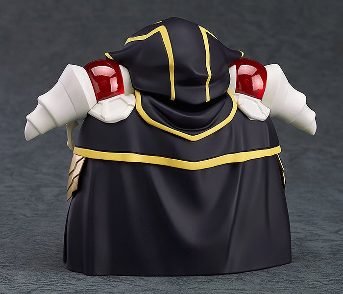 Ainz seated on a dark throne with one arm resting on the armrest and head slightly tilted