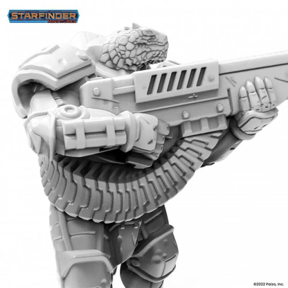 Grey Starfinder Vesk Free Captain miniature of a scaled warrior in combat armor, aiming a large futuristic rifle