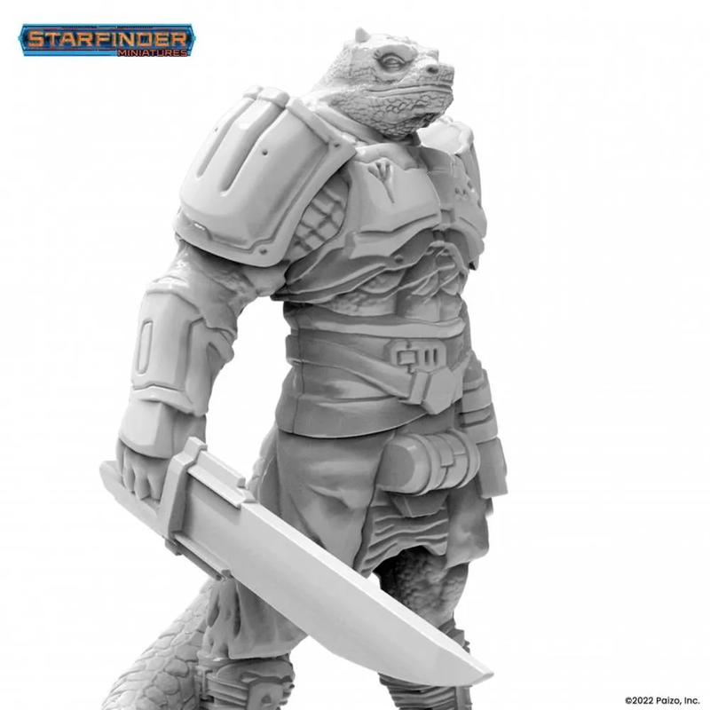 An unpainted gray Starfinder Vesk Solarian miniature of an armored reptilian alien holding a broad sword