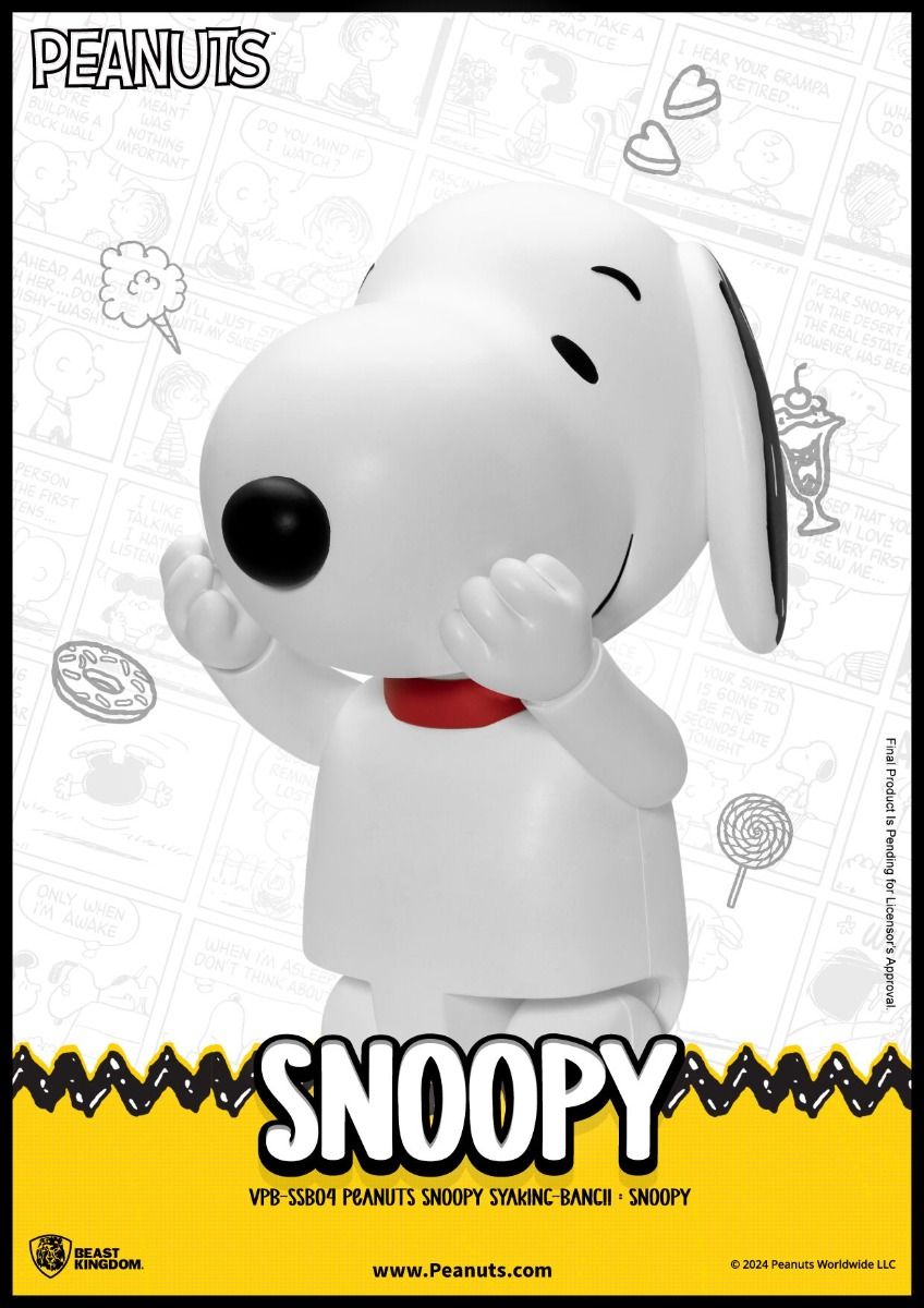 White vinyl figure of Snoopy from Peanuts with black ears and nose wearing a red collar holding paws to face