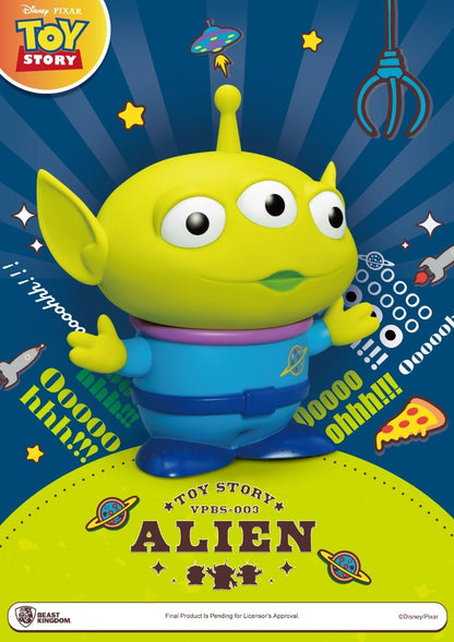 Close-up of Alien figure’s face with three eyes and antenna details