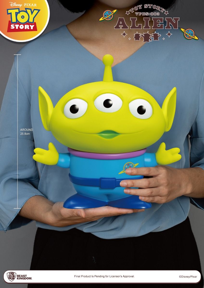 Top view highlighting coin slot and figure details