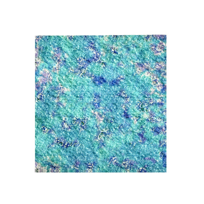Abstract mottled pattern of blue, teal, and white, with a subtle grid texture
