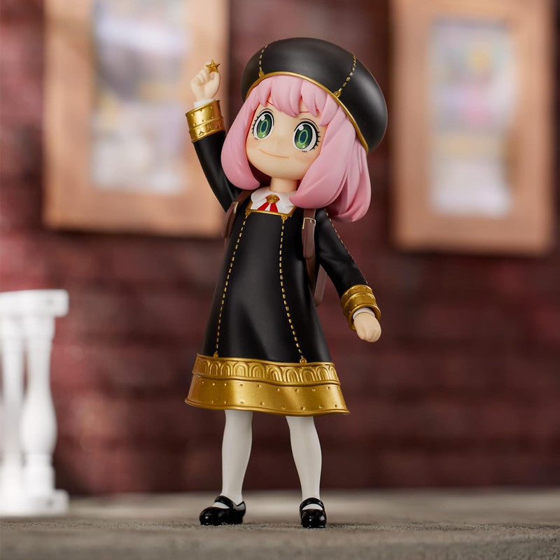 Anya Forger Nendoroid figure from SPYxFAMILY anime in her black Eden Academy uniform holding up a gold star
