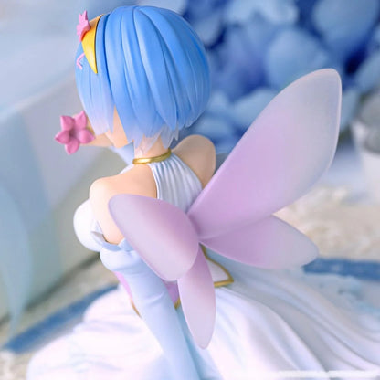 Blue-haired anime fairy figure in a white dress with purple wings
