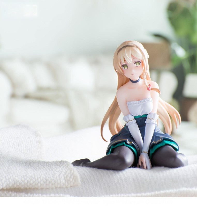 Detailed figure of a blonde-haired anime girl in a blue and white dress on a white surface