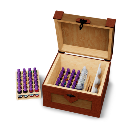 An open wooden chest holds purple-capped ink bottles, brushes, and a palette, with more ink bottles on a nearby rack.
