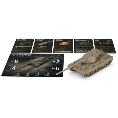 A miniature tan Conqueror tank sits next to game cards with its stats and upgrade cards