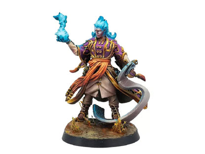 Miniature figure of a warrior-mage with blue fiery hair casting a blue spell and wielding a curved sword