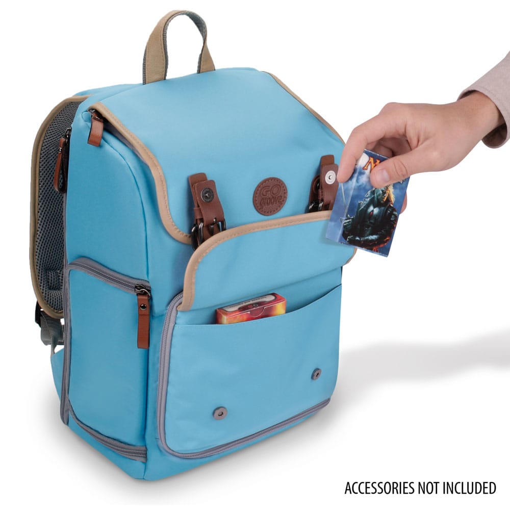 Hand inserts a trading card into a light blue &quot;GO Groove&quot; backpack&#39;s front pocket.